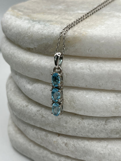 925 Sterling Silver Trilogy Swiss Blue Topaz Pendant on 45cm Sterling Silver Chain