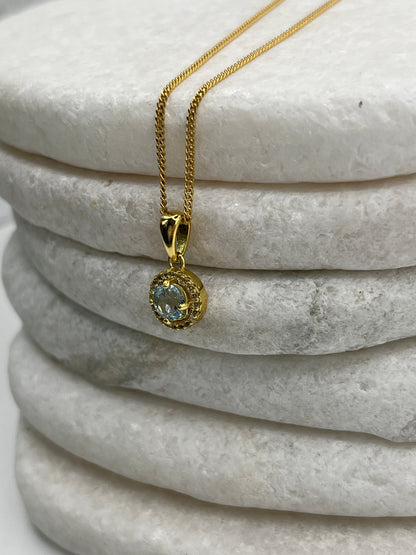 925 Sterling Silver Gold Gilded Blue Topaz Halo Pendant on 45cm Sterling Silver Chain