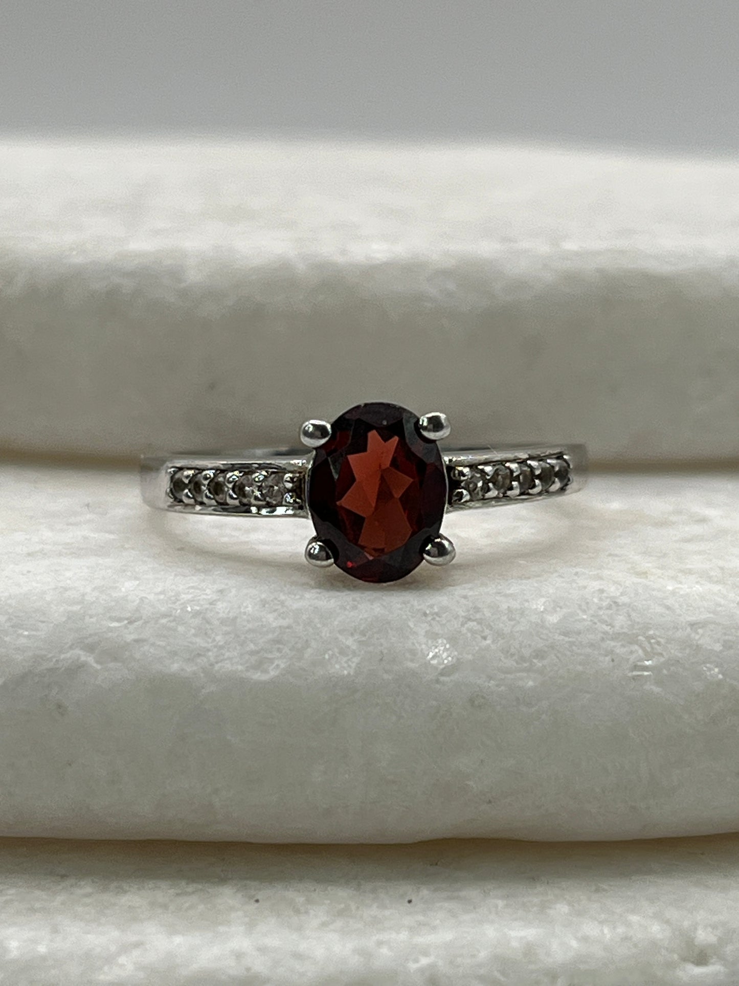 925 Sterling Silver Garnet Ring with White Topaz Shoulders - Size S