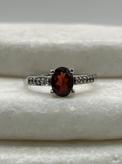 925 Sterling Silver Garnet Ring with White Topaz Shoulders - Size S
