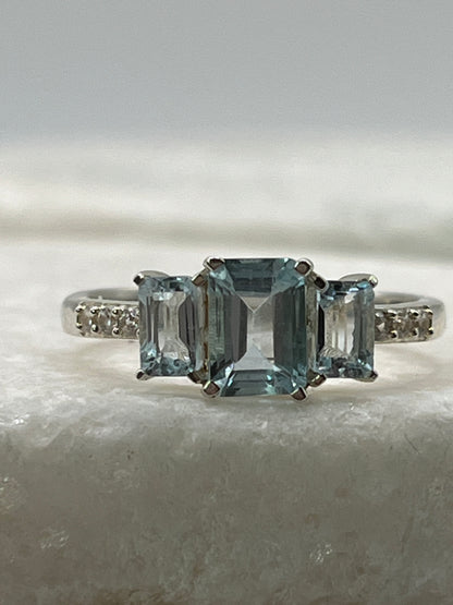925 Sterling Silver Emerald Cut Aquamarine Trilogy Ring With White Topaz - Size Q